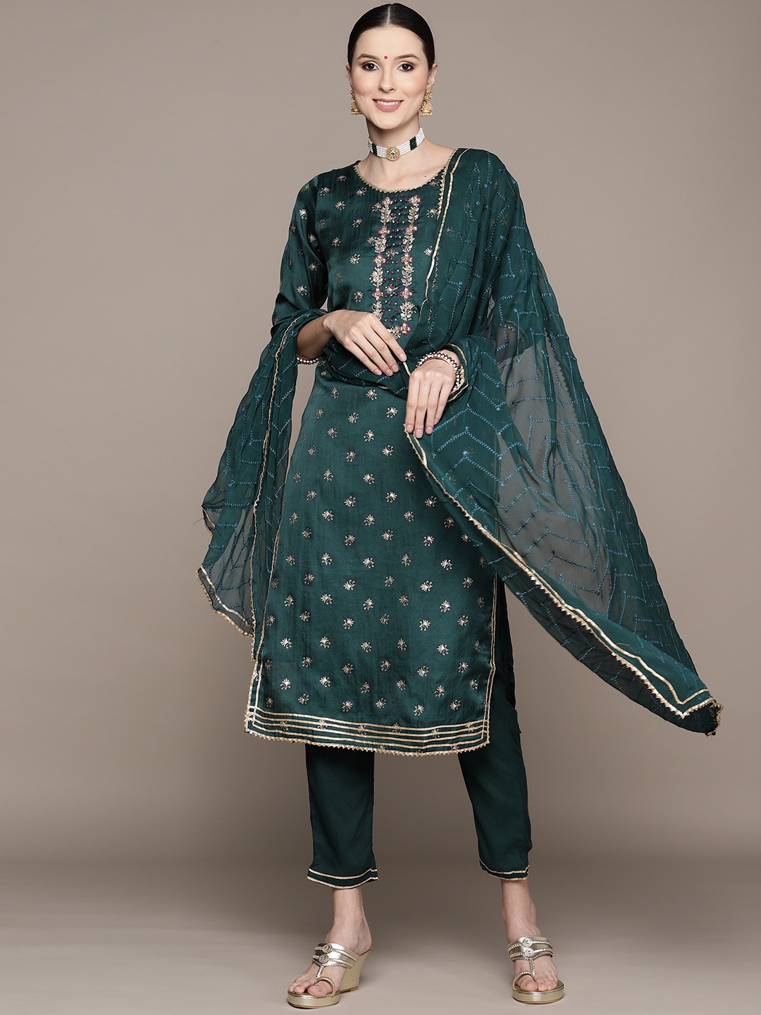 Ishin Women Green Floral Embroidered Beads and Stones Kurta with Trousers & With Dupatta
Ishin Women Green Floral Embroidered Beads and Stones Kurta with Trousers & With Dupatta