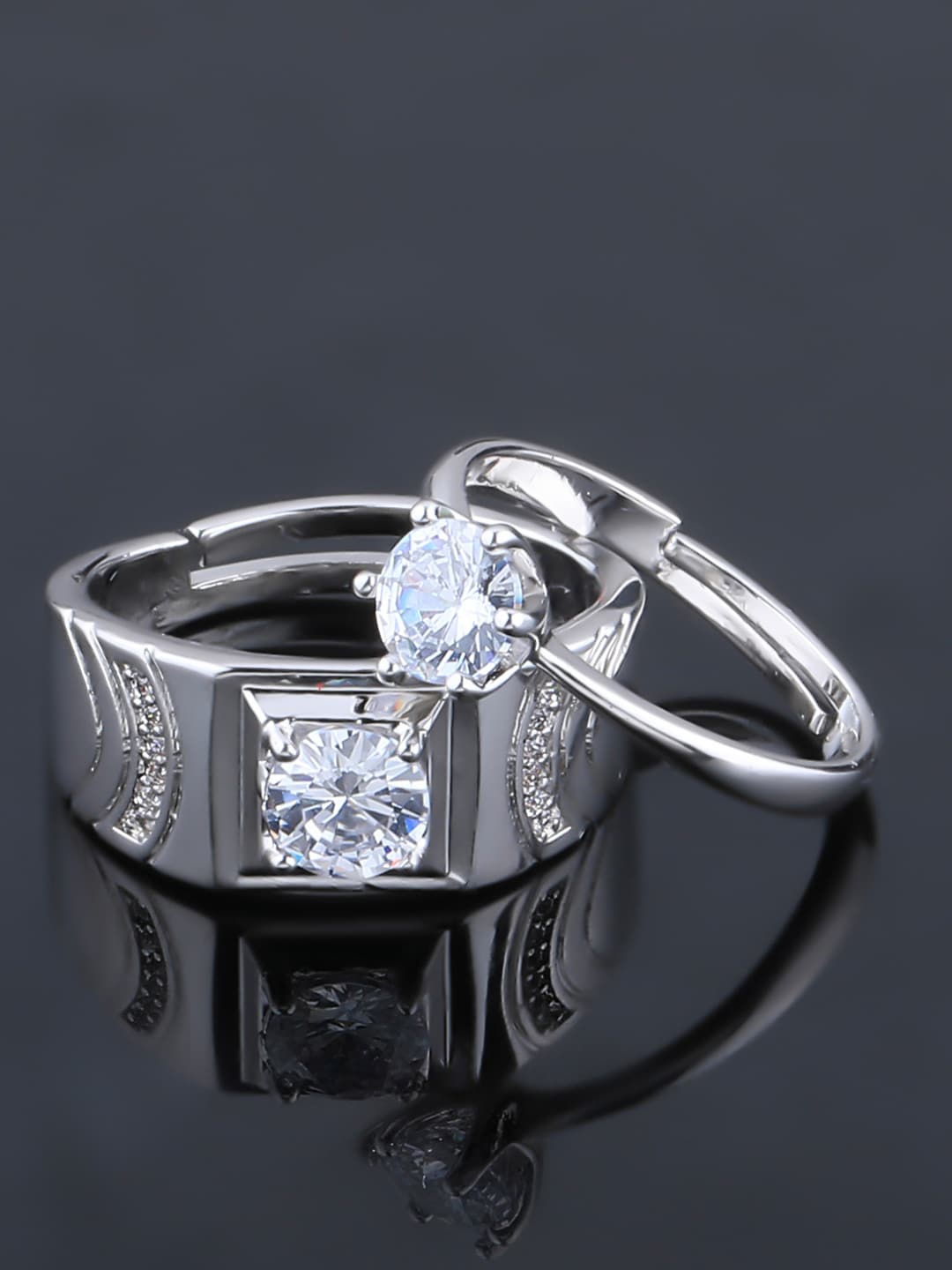 Silver Shine Set Of 2 Silver-Plated White Stone-Studded Adjustable Couple Finger Ring
Silver Shine Set Of 2 Silver-Plated White Stone-Studded Adjustable Couple Finger Ring