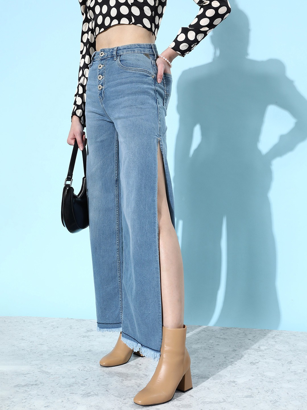 Roadster Women Wide Leg High-Rise Light Fade Stretchable Jeans With Side Slit Detail, Blue
Roadster Women Wide Leg High-Rise Light Fade Stretchable Jeans With Side Slit Detail, Blue