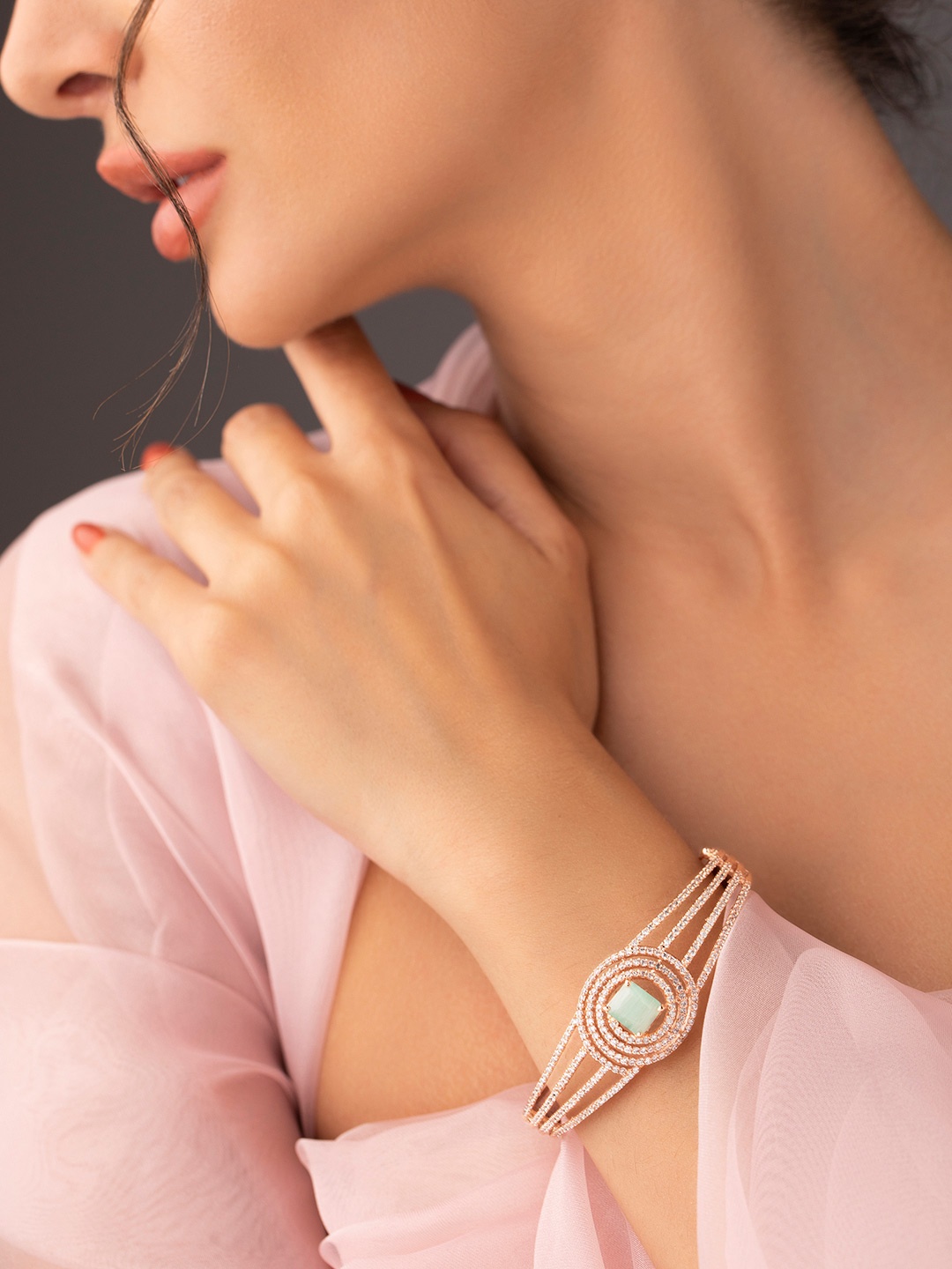 Rubans Women Rose Gold & Green American Diamond Handcrafted Rose Gold-Plated Bangle-Style Bracelet
Rubans Women Rose Gold & Green American Diamond Handcrafted Rose Gold-Plated Bangle-Style Bracelet