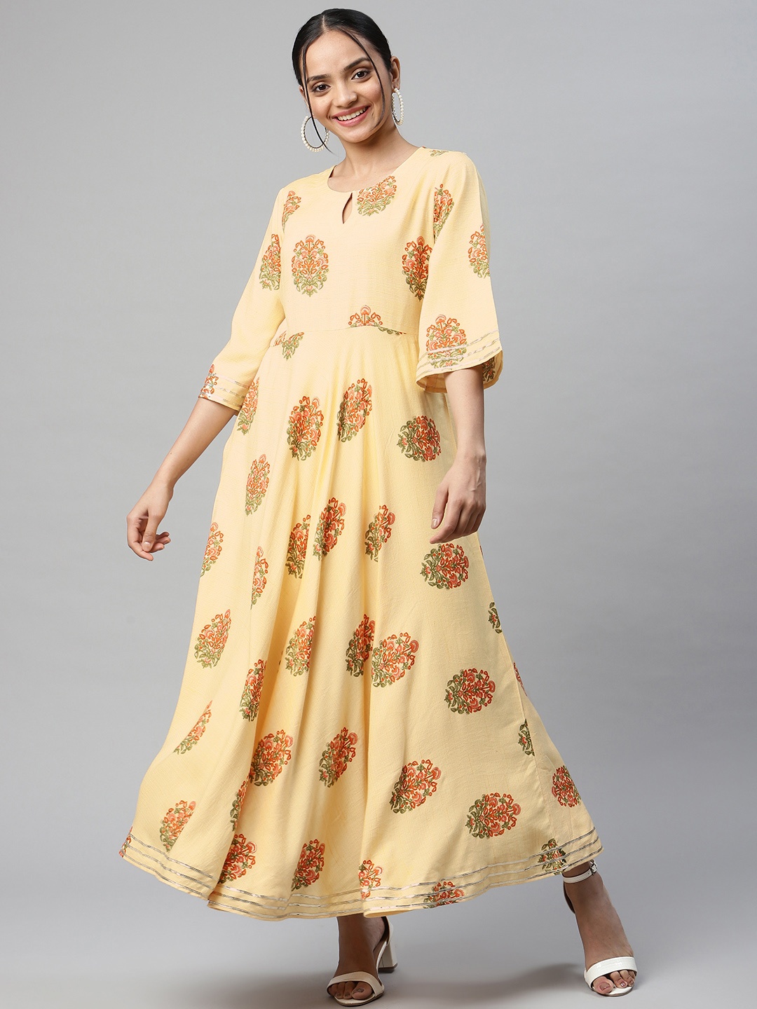 V TRADITION Women Yellow & Red Floral Printed Keyhole Neck Bell Sleeves Anarkali Kurta
V TRADITION Women Yellow & Red Floral Printed Keyhole Neck Bell Sleeves Anarkali Kurta
