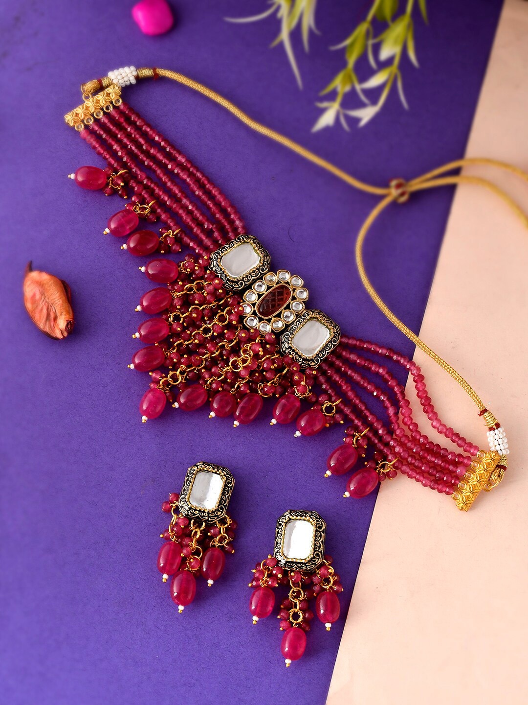 Silvermerc Designs Women Gold-Plated Artificial Stone & Beads Studded Layered Jewellery Set
Silvermerc Designs Women Gold-Plated Artificial Stone & Beads Studded Layered Jewellery Set
