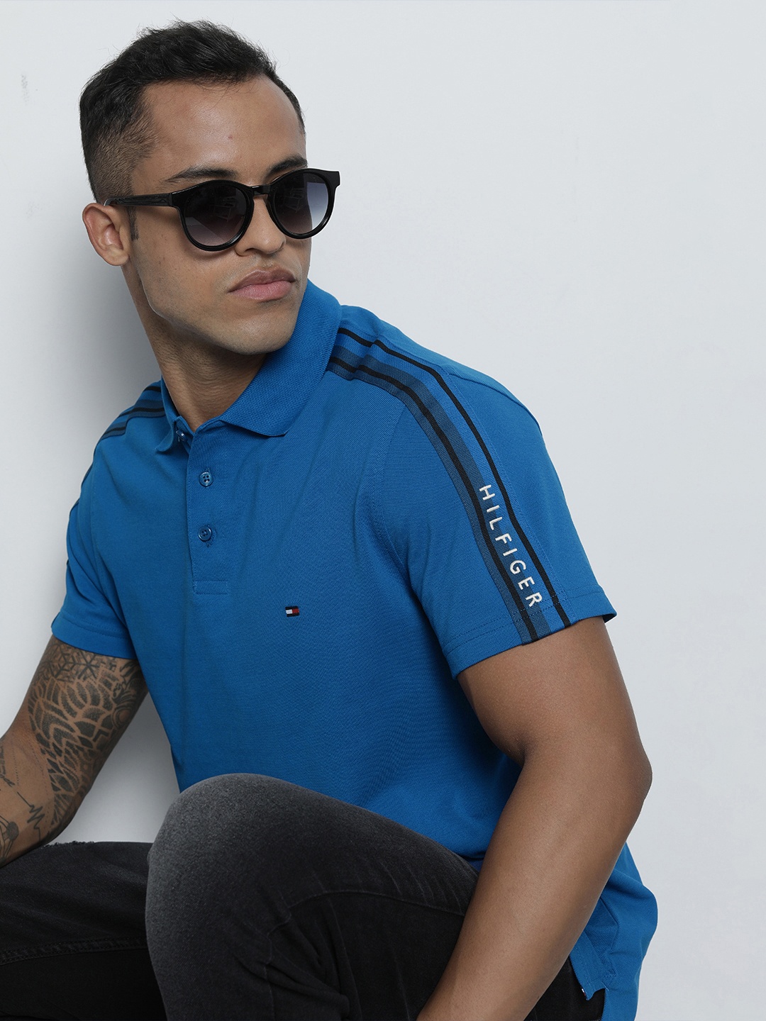 Tommy Hilfiger Men Blue Polo Collar Organic Cotton Slim Fit T-shirt with Shoulder Taping
Tommy Hilfiger Men Blue Polo Collar Organic Cotton Slim Fit T-shirt with Shoulder Taping