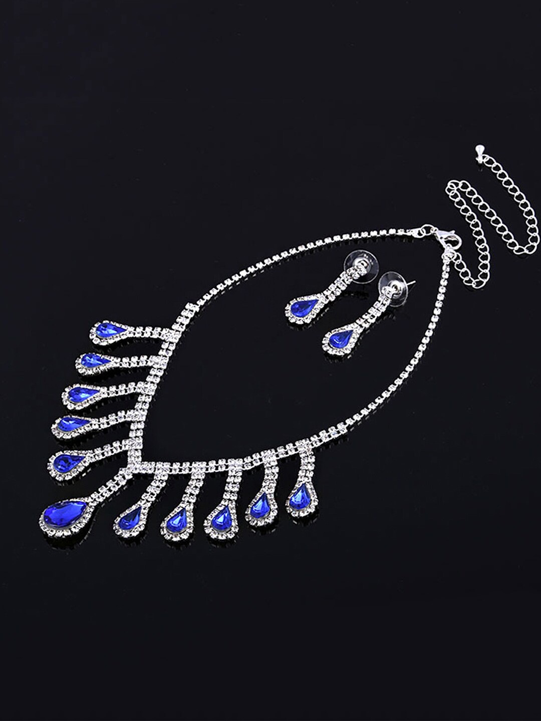 Yellow Chimes Silver-Plated White & Blue Stone-Studded & Crystal-Studded Jewellery Set
Yellow Chimes Silver-Plated White & Blue Stone-Studded & Crystal-Studded Jewellery Set