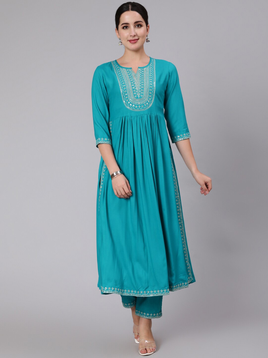 KIMAYRA Women Sea Green Ethnic Motifs Yoke Design Empire Kurti with Trousers & With Dupatta
KIMAYRA Women Sea Green Ethnic Motifs Yoke Design Empire Kurti with Trousers & With Dupatta