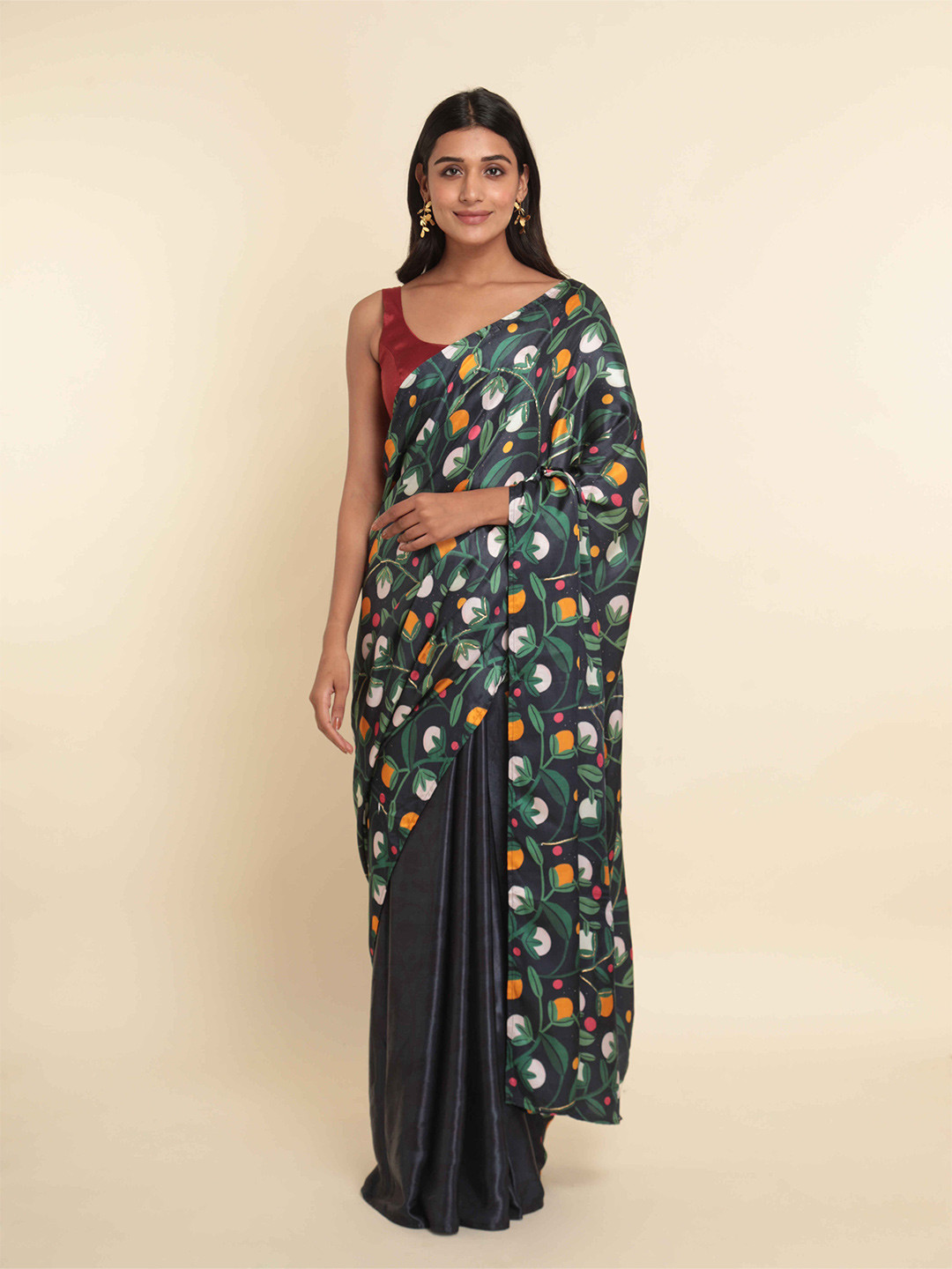 Suta Black & Green Floral Printed Saree 
Suta Black & Green Floral Printed Saree