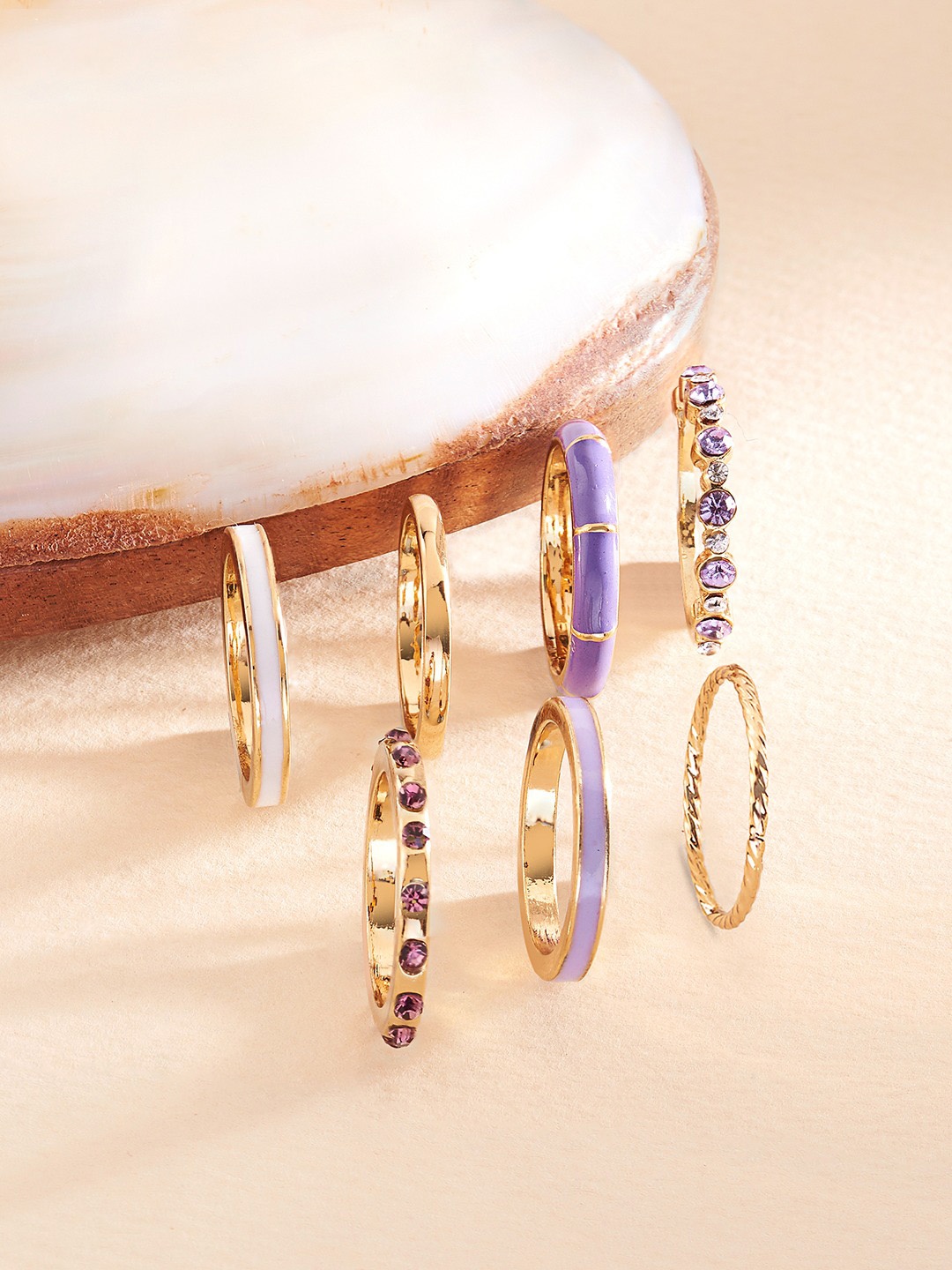 Zaveri Pearls Set of 7 Gold-Plated Purple Stone Studded Contemporary Stackable Rings
Zaveri Pearls Set of 7 Gold-Plated Purple Stone Studded Contemporary Stackable Rings