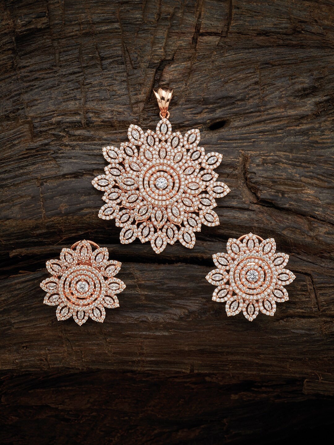 Kushal's Fashion Jewellery Rose Gold-Plated White Stone Studded Floral Pendant & Earrings
Kushal's Fashion Jewellery Rose Gold-Plated White Stone Studded Floral Pendant & Earrings