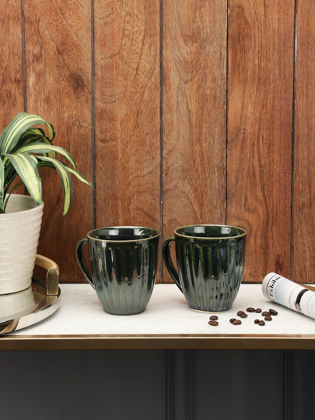VarEesha Green Handcrafted and Hand Painted Textured Ceramic Glossy Mugs Set of Cups and Mugs
VarEesha Green Handcrafted and Hand Painted Textured Ceramic Glossy Mugs Set of Cups and Mugs