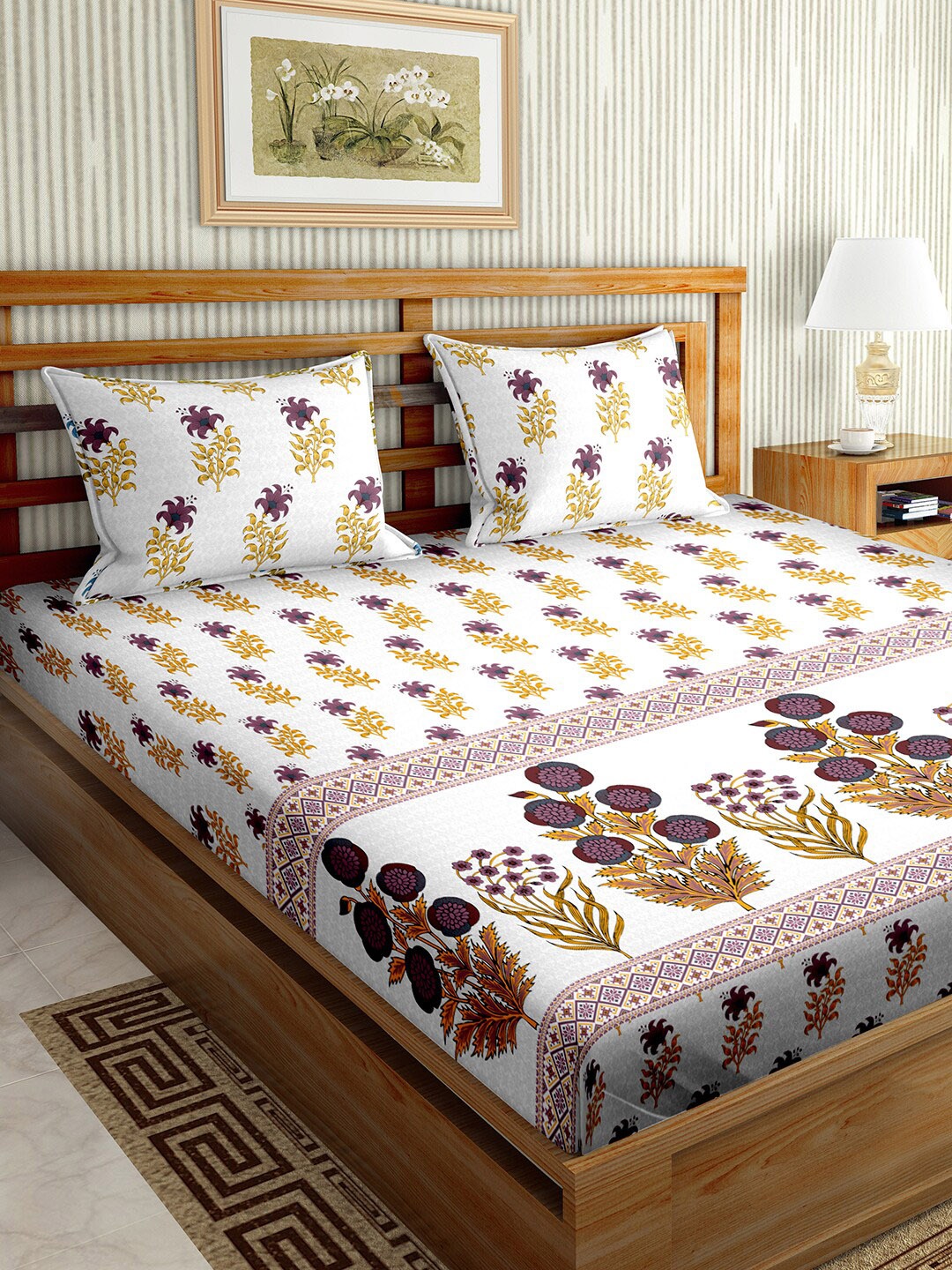 BELLA CASA Purple & Off White Floral 180 TC King Cotton Bedsheet with 2 Pillow Covers
BELLA CASA Purple & Off White Floral 180 TC King Cotton Bedsheet with 2 Pillow Covers
