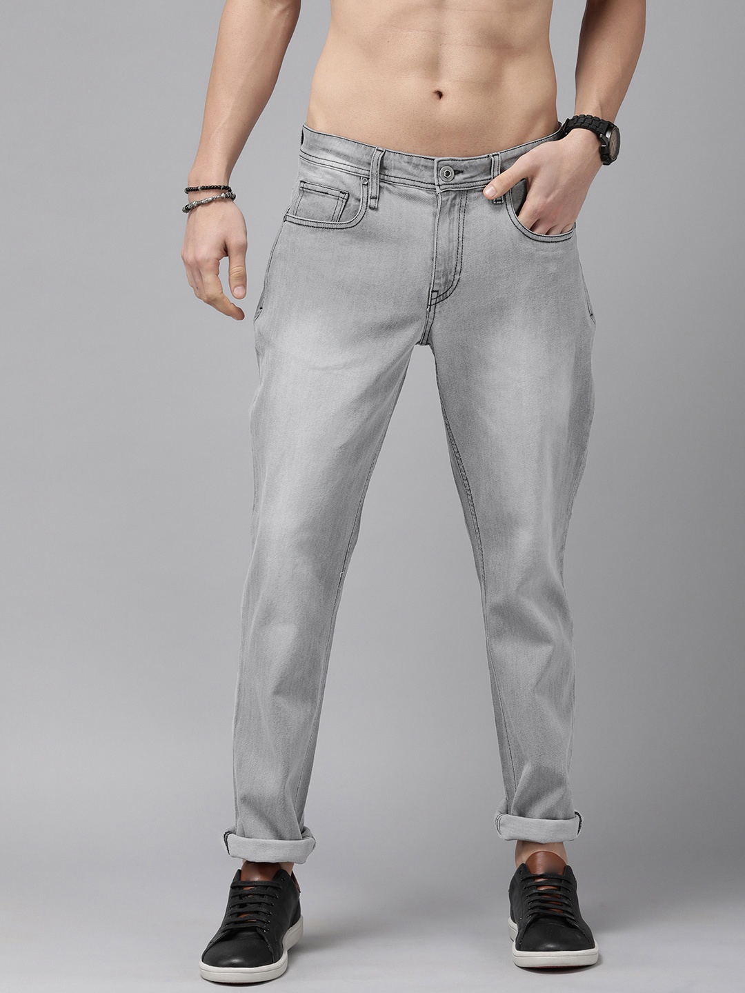 The Roadster Lifestyle Co Men Grey Regular Fit Heavy Fade Mid-Rise Stretchable Jeans, Blue
The Roadster Lifestyle Co Men Grey Regular Fit Heavy Fade Mid-Rise Stretchable Jeans, Blue