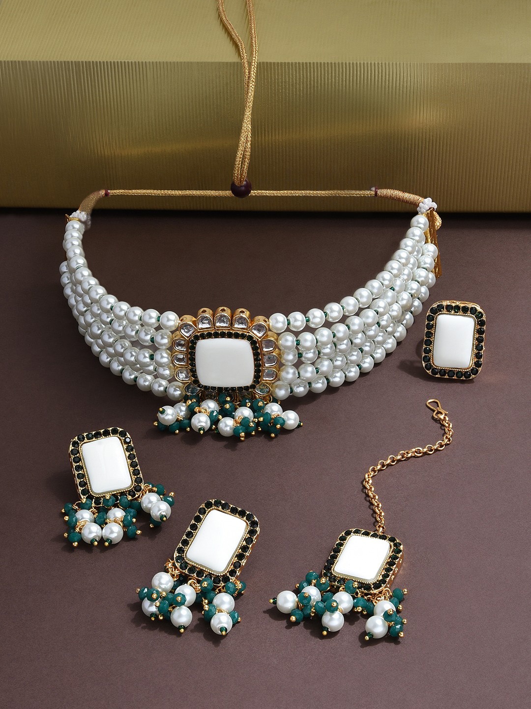 Zaveri Pearls Women White & Green Gold-Plated Kundan & Pearls Studded Choker Jewellery Set
Zaveri Pearls Women White & Green Gold-Plated Kundan & Pearls Studded Choker Jewellery Set