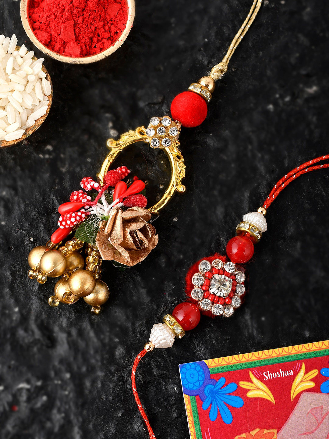 Shoshaa Set Of 2 Gold & Red lumba Combo Bhai Rakhi With Roli Chawal
Shoshaa Set Of 2 Gold & Red lumba Combo Bhai Rakhi With Roli Chawal