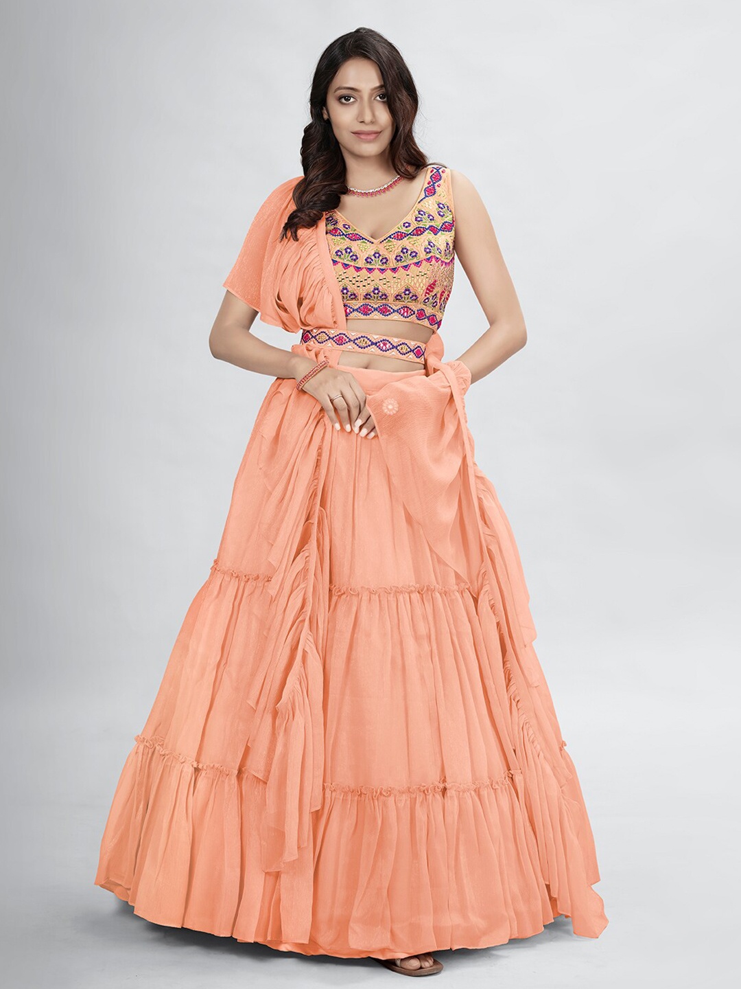 DRESSTIVE Peach-Coloured & Blue Embellished Mirror Work Semi-Stitched Lehenga & Unstitched Blouse With
DRESSTIVE Peach-Coloured & Blue Embellished Mirror Work Semi-Stitched Lehenga & Unstitched Blouse With