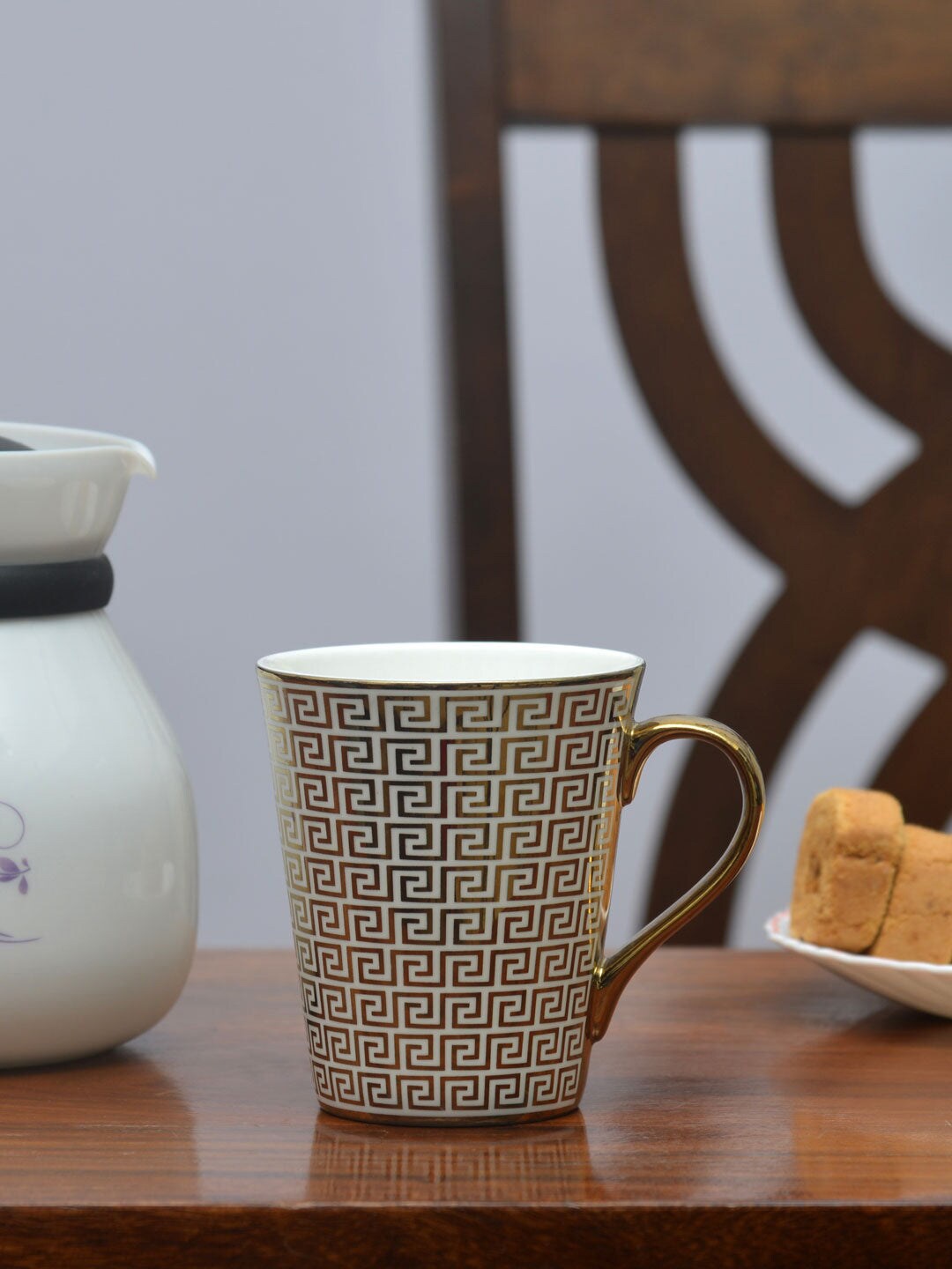 Athome by Nilkamal Gold-Toned & White Printed Ceramic Glossy Mugs Set of Cups and Mugs
Athome by Nilkamal Gold-Toned & White Printed Ceramic Glossy Mugs Set of Cups and Mugs