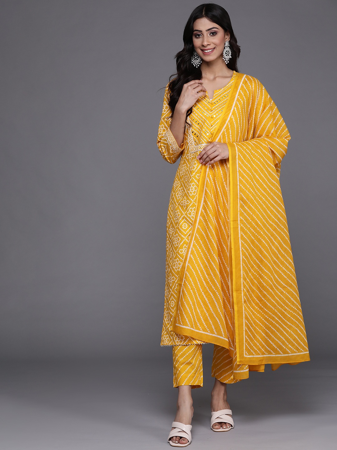 Varanga Women Mustard Yellow Bandhani Printed Pure Cotton Kurta with Trousers & Dupatta
Varanga Women Mustard Yellow Bandhani Printed Pure Cotton Kurta with Trousers & Dupatta
