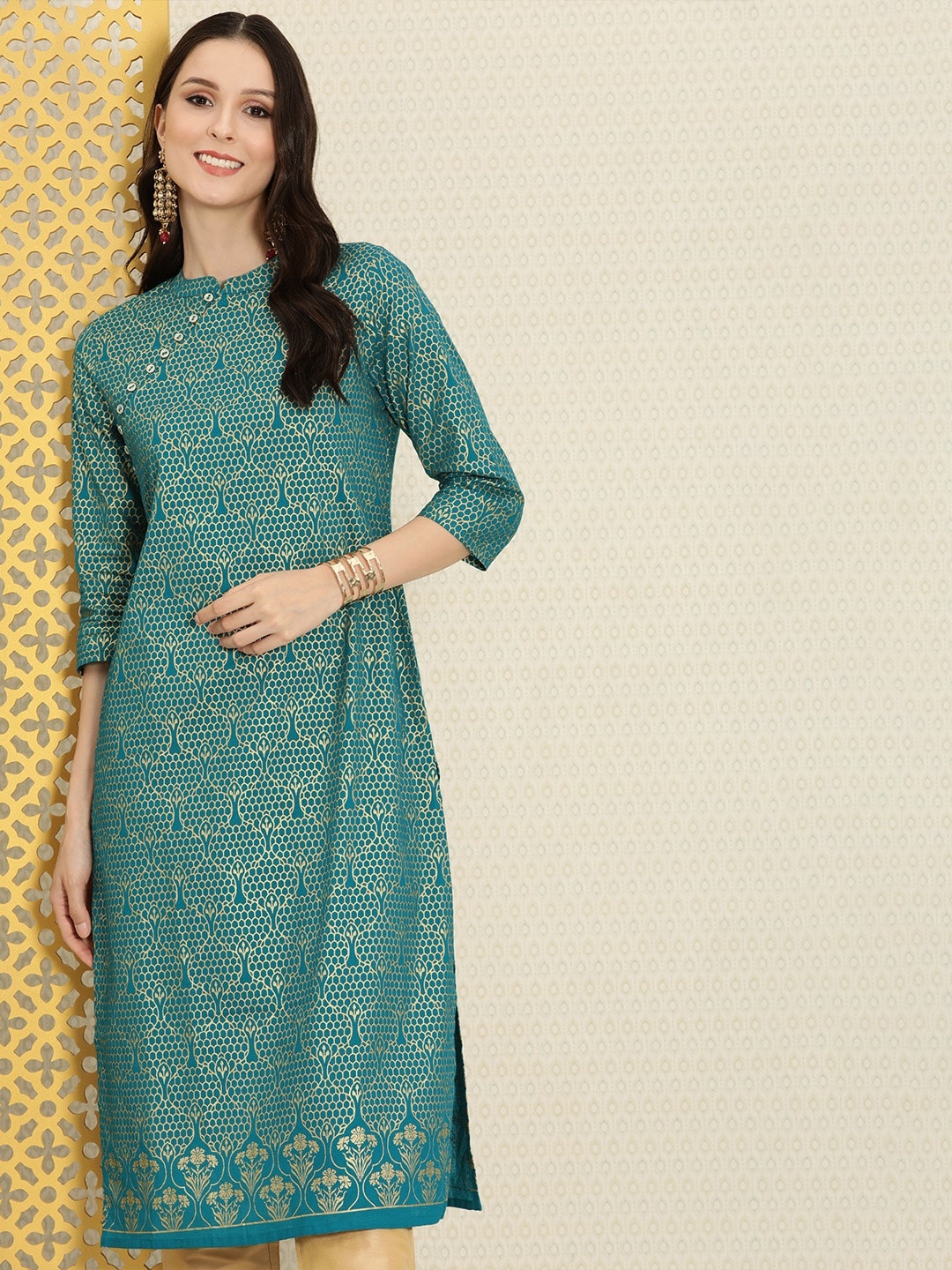 House of Pataudi Women Teal Green & Golden Ethnic Motifs Printed Pure Cotton Rozana Kurta
House of Pataudi Women Teal Green & Golden Ethnic Motifs Printed Pure Cotton Rozana Kurta