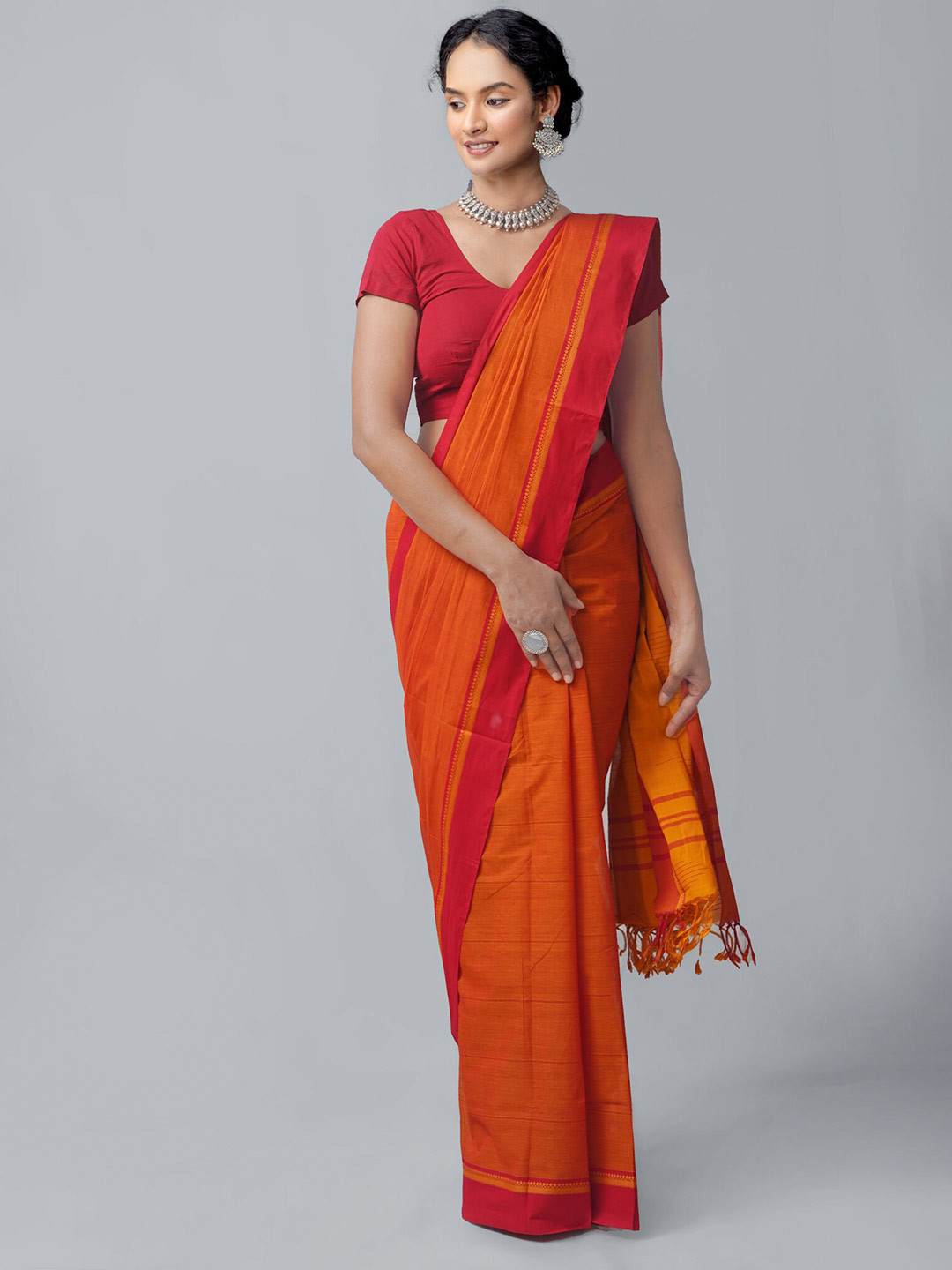 Unnati Silks Orange Ethnic Motifs Zari Pure Cotton Kanjeevaram Saree
Unnati Silks Orange Ethnic Motifs Zari Pure Cotton Kanjeevaram Saree
