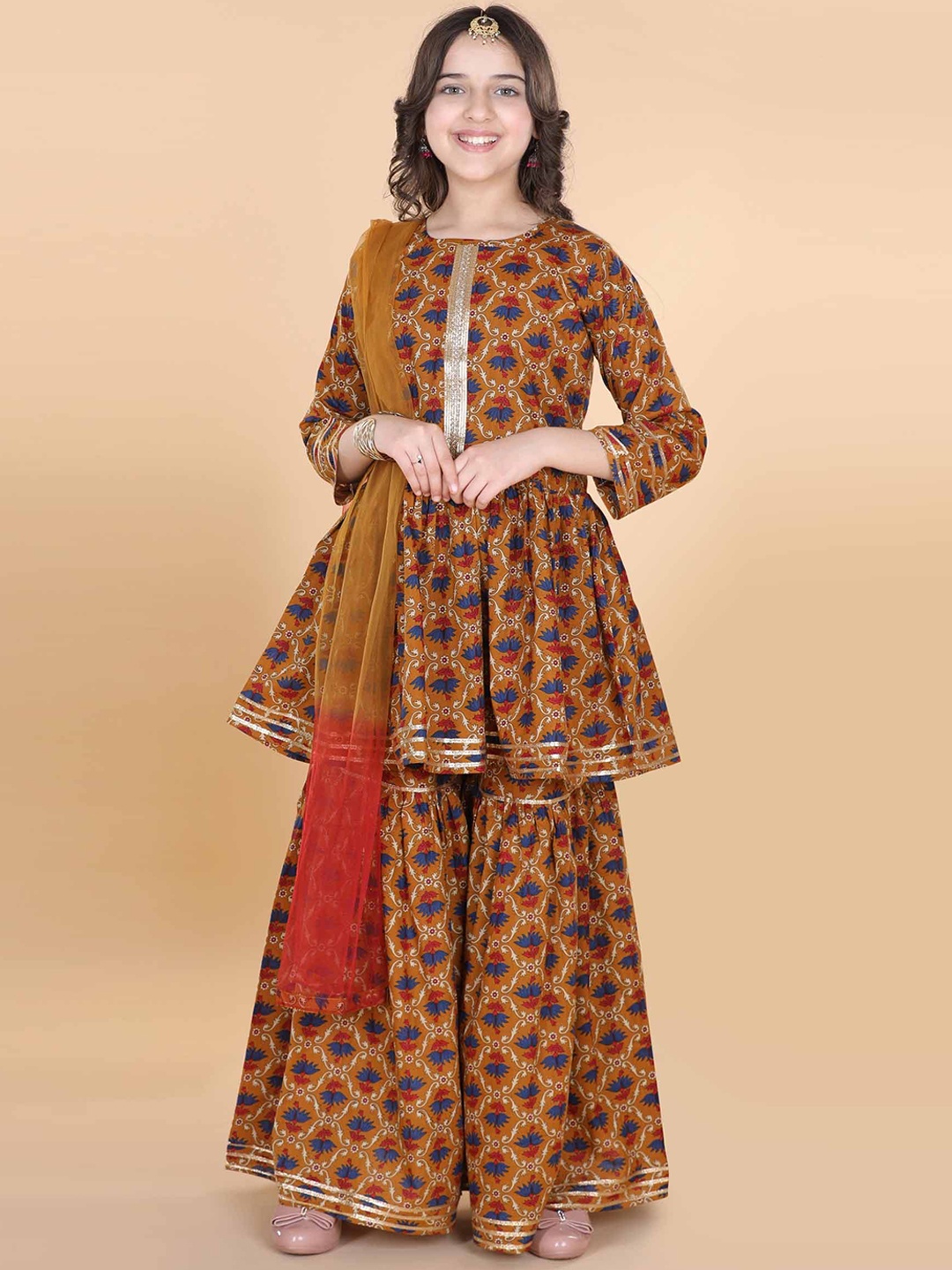 ADIVA Girls Mustard Yellow Floral Pleated Gotta Patti Pure Cotton Kurti with Sharara & With Dupatta
ADIVA Girls Mustard Yellow Floral Pleated Gotta Patti Pure Cotton Kurti with Sharara & With Dupatta
