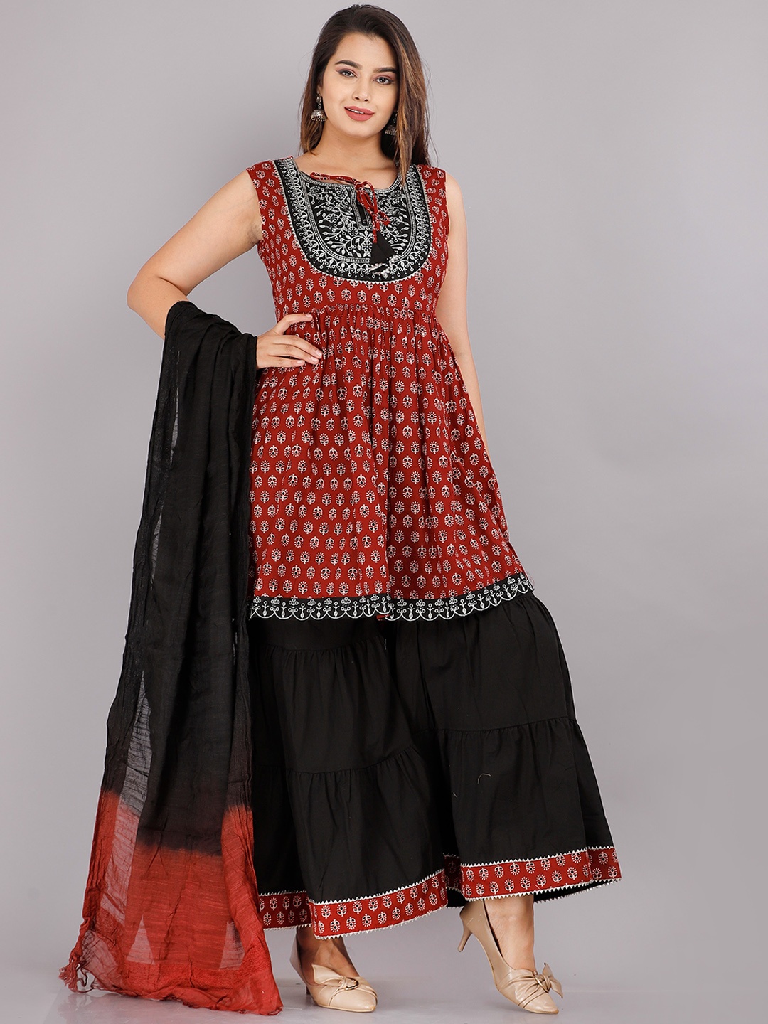 KALINI Women Maroon Ethnic Motifs Printed Pure Cotton Kurta with Sharara & With Dupatta
KALINI Women Maroon Ethnic Motifs Printed Pure Cotton Kurta with Sharara & With Dupatta