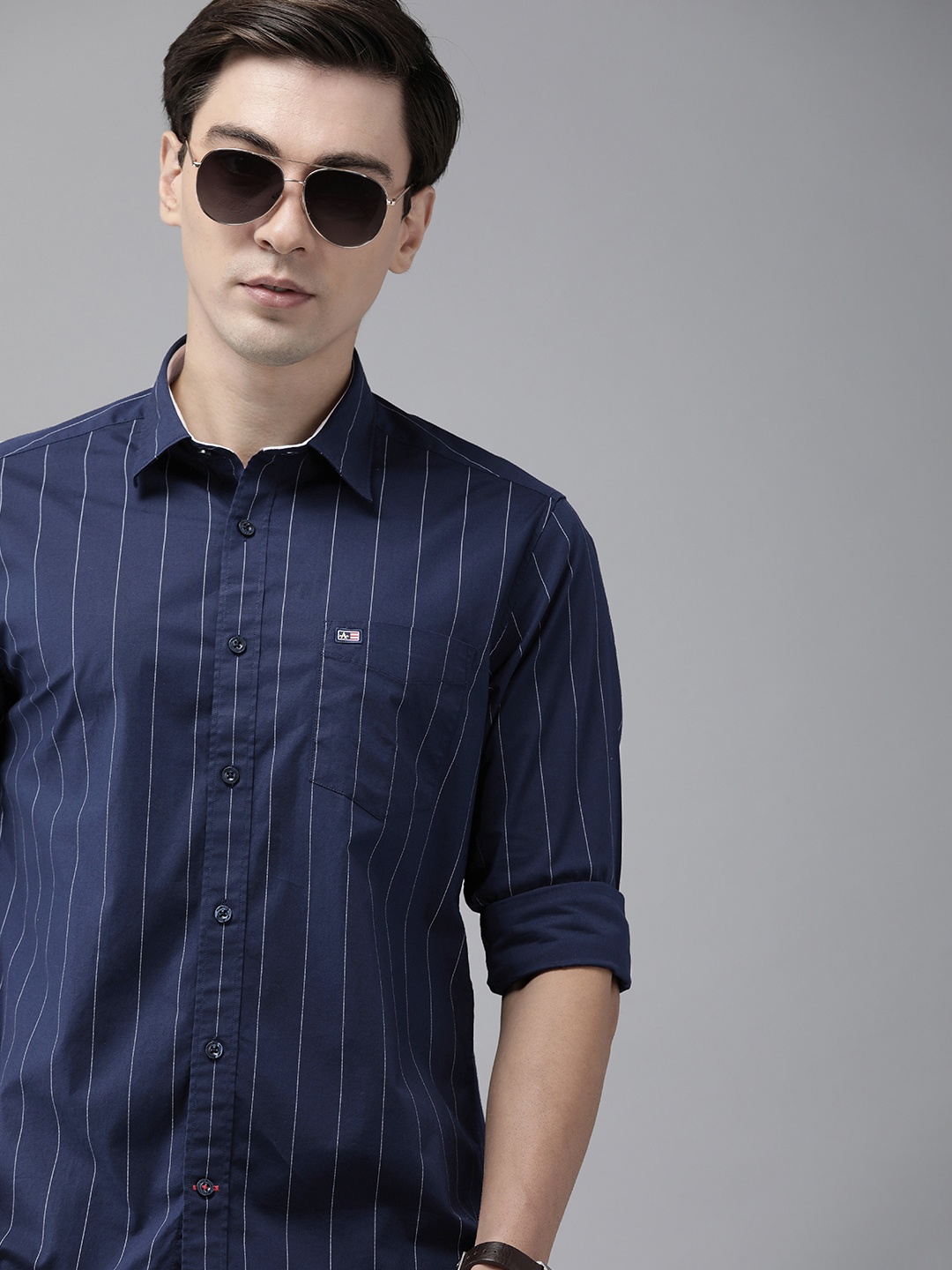 Arrow Sport Men Navy Blue & White Manhattan Slim Fit Striped Pure Cotton Casual Shirt
Arrow Sport Men Navy Blue & White Manhattan Slim Fit Striped Pure Cotton Casual Shirt