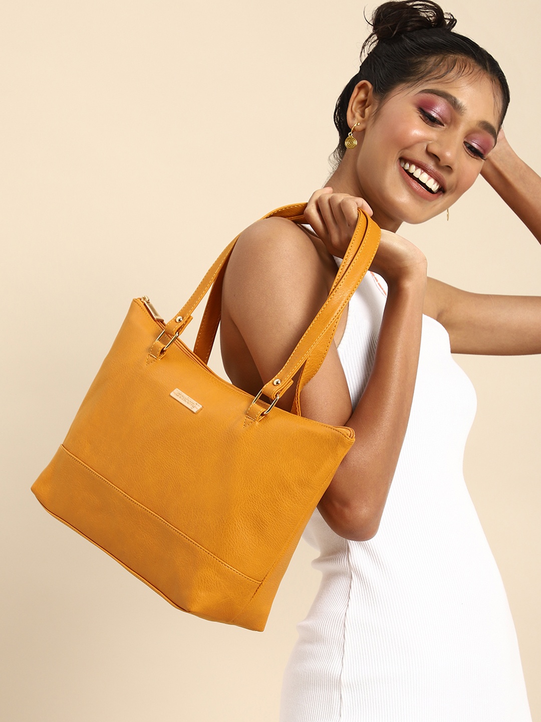 DressBerry Women Solid Structured Shoulder Bag, Mustard