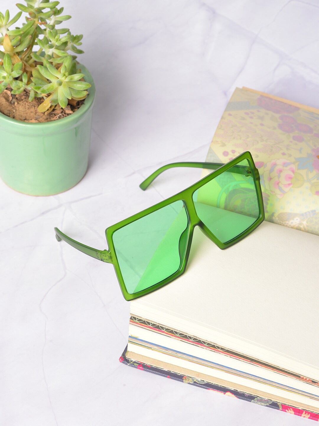 HAUTE SAUCE by Campus Sutra Women Green Lens & Green Oversized Sunglasses with Polarised Lens
HAUTE SAUCE by Campus Sutra Women Green Lens & Green Oversized Sunglasses with Polarised Lens