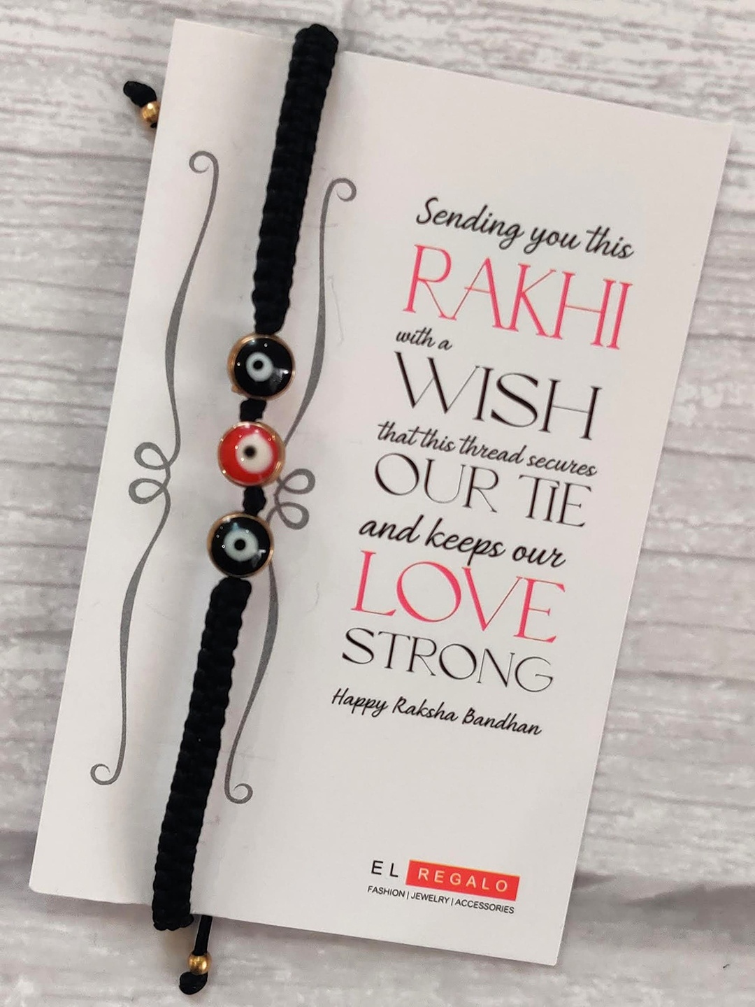 EL REGALO Bracelet Rakhi Combo for Bhaiya With Roli Chawal Shagun and Greeting Card, Black
EL REGALO Bracelet Rakhi Combo for Bhaiya With Roli Chawal Shagun and Greeting Card, Black