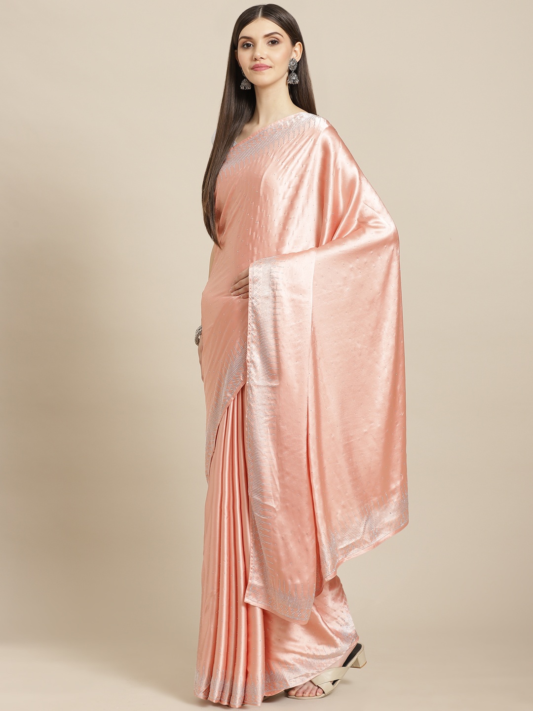 CAMPAIGN TRENDS Peach-Coloured Embellished Beads and Stones Satin Saree with Blouse Piece
CAMPAIGN TRENDS Peach-Coloured Embellished Beads and Stones Satin Saree with Blouse Piece