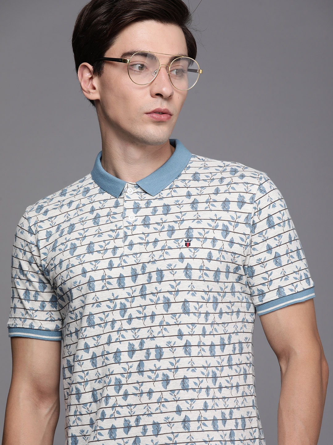 Louis Philippe Jeans Men Off White & Blue Floral Printed Polo Collar Pure Cotton T-shirt
Louis Philippe Jeans Men Off White & Blue Floral Printed Polo Collar Pure Cotton T-shirt