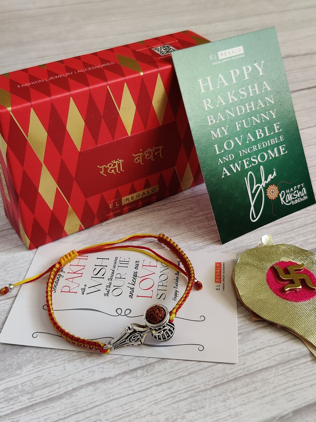 EL REGALO Bracelet Rakhi Combo for Bhaiya With Roli Chawal Shagun and Greeting Card, Silver
EL REGALO Bracelet Rakhi Combo for Bhaiya With Roli Chawal Shagun and Greeting Card, Silver