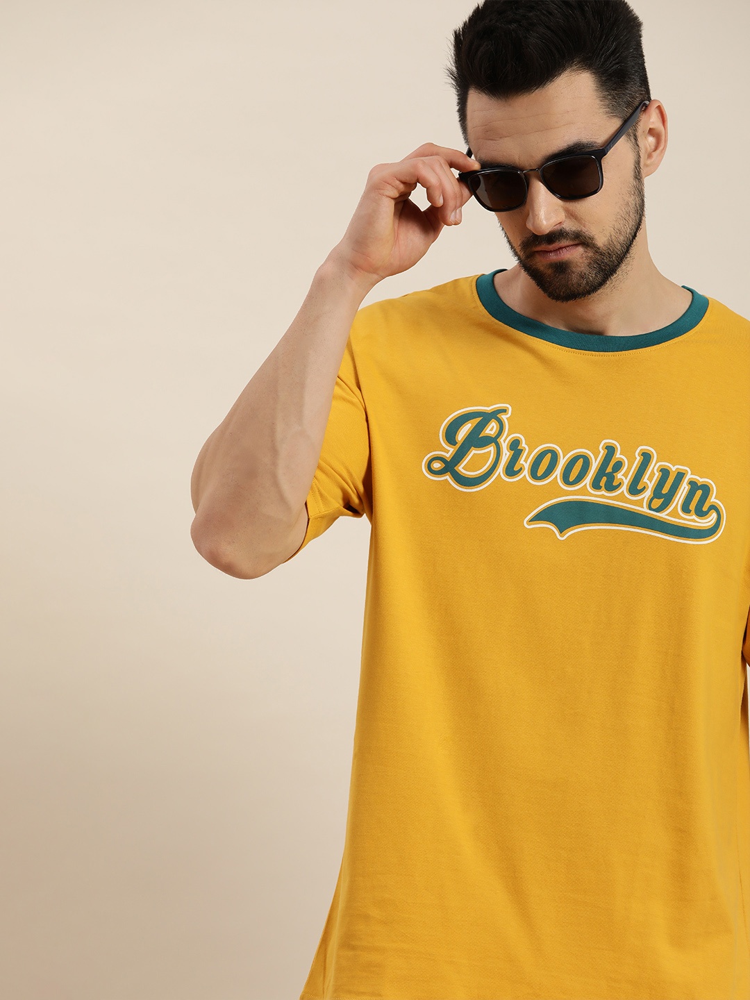 DILLINGER Men Mustard Yellow & Blue Typography Printed Pure Cotton Oversized T-shirt
DILLINGER Men Mustard Yellow & Blue Typography Printed Pure Cotton Oversized T-shirt