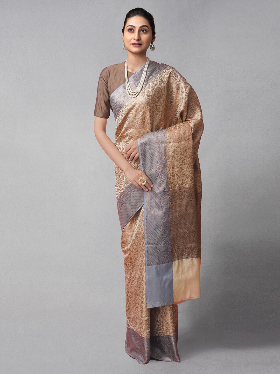 Unnati Silks Cream-Coloured & Gold-Toned Woven Design Zari Silk Cotton Banarasi Saree
Unnati Silks Cream-Coloured & Gold-Toned Woven Design Zari Silk Cotton Banarasi Saree