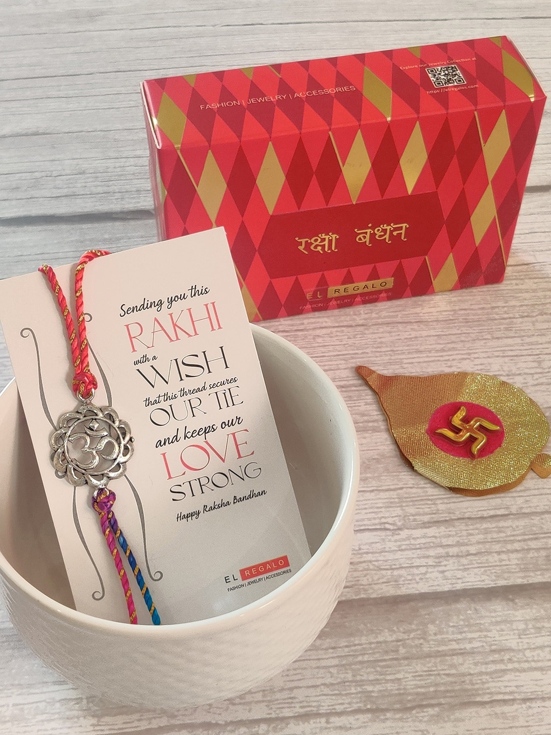 EL REGALO 925 Sterling Silver Red Rakhi Combo with Greeting card and Roli Chawal Shagun
EL REGALO 925 Sterling Silver Red Rakhi Combo with Greeting card and Roli Chawal Shagun