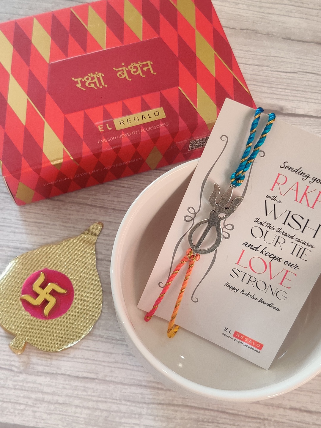 EL REGALO 925 Sterling Silver Red Rakhi Combo with Greeting card and Roli Chawal shagun, Multi
EL REGALO 925 Sterling Silver Red Rakhi Combo with Greeting card and Roli Chawal shagun, Multi