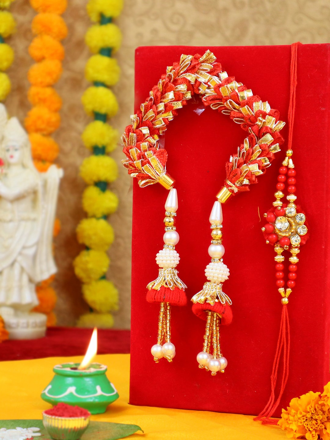 TIED RIBBONS Red & Golden Premium Bhaiya Bhabhi Lumba Bangle Rakhi with Card & Roli Chawal, Multi
TIED RIBBONS Red & Golden Premium Bhaiya Bhabhi Lumba Bangle Rakhi with Card & Roli Chawal, Multi