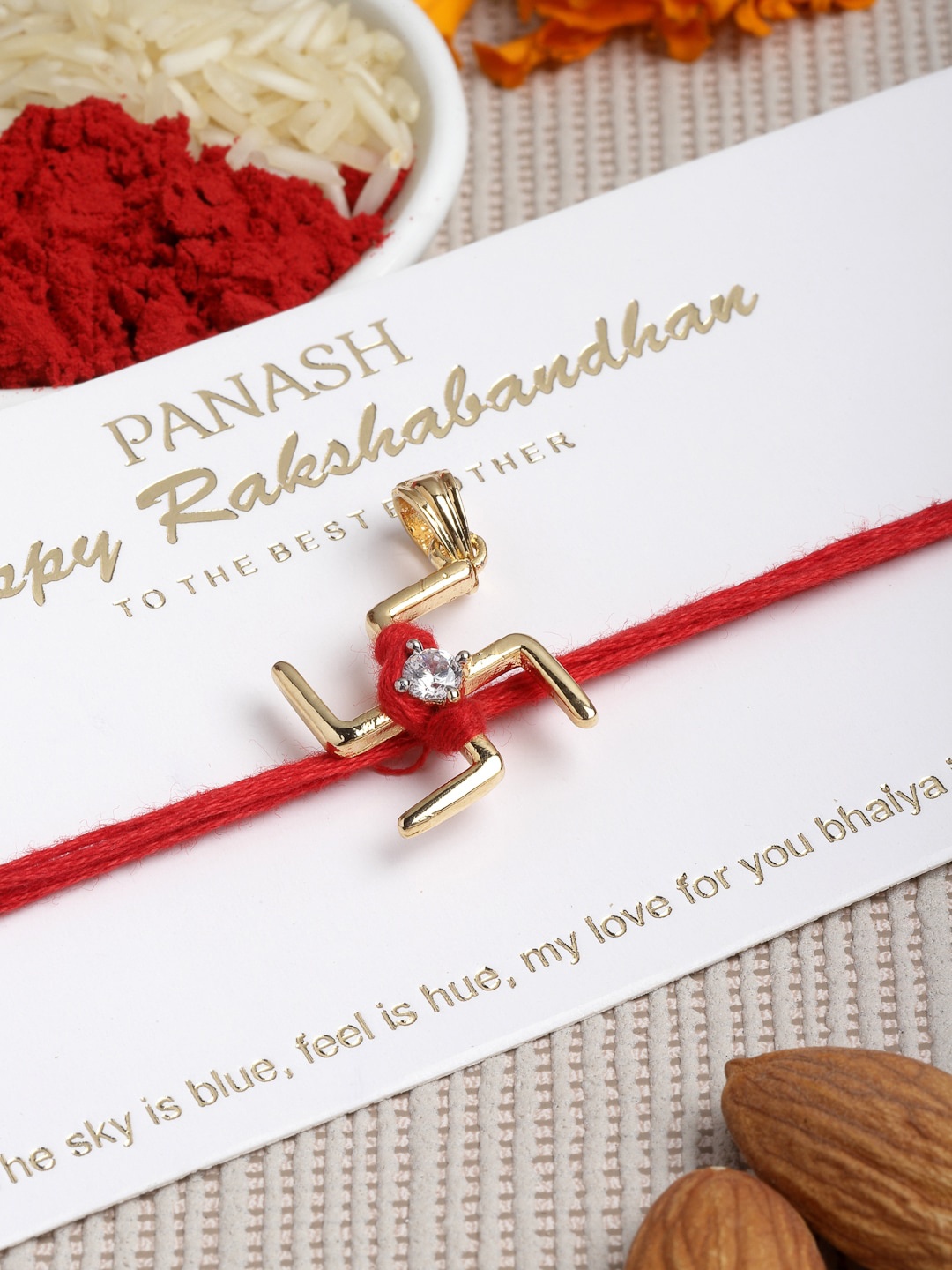 PANASH Men Gold-Toned AD Stone Handcrafted Convertible Pendant Rakhi With Roli Chawal, Red
PANASH Men Gold-Toned AD Stone Handcrafted Convertible Pendant Rakhi With Roli Chawal, Red