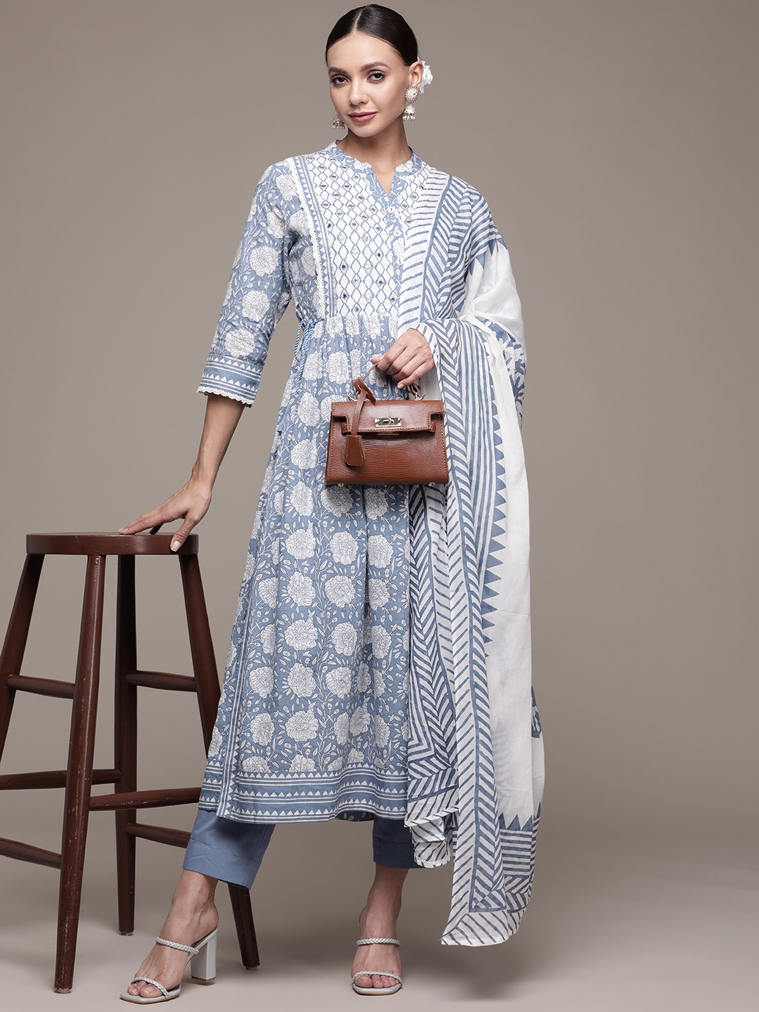 Ishin Women Blue Ethnic Motifs Printed High Slit Mirror Work Kurta with Trousers & Dupatta
Ishin Women Blue Ethnic Motifs Printed High Slit Mirror Work Kurta with Trousers & Dupatta
