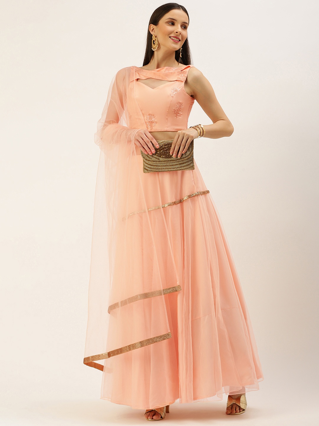 Ethnovog Peach-Coloured Embroidered Sequinned Ready to Wear Lehenga Blouse With Dupatta
Ethnovog Peach-Coloured Embroidered Sequinned Ready to Wear Lehenga Blouse With Dupatta