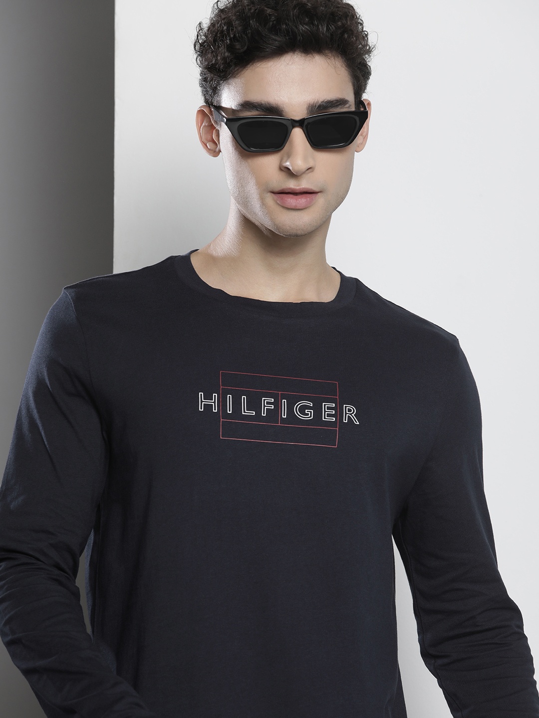 Tommy Hilfiger Men Navy Blue & White Typography Printed Pure Cotton Slim Fit T-shirt
Tommy Hilfiger Men Navy Blue & White Typography Printed Pure Cotton Slim Fit T-shirt