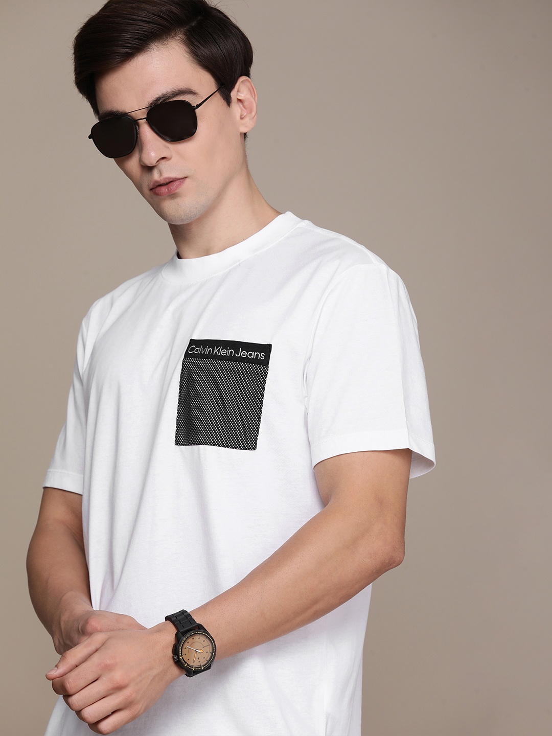 Calvin Klein Jeans Men White & Black Brand Logo Printed Pure Cotton Slim Fit T-shirt
Calvin Klein Jeans Men White & Black Brand Logo Printed Pure Cotton Slim Fit T-shirt