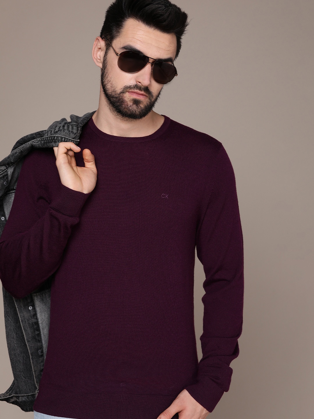 Calvin Klein Jeans Men Purple Solid Woolen Pullover with Brand Logo Embroidered Deatail
Calvin Klein Jeans Men Purple Solid Woolen Pullover with Brand Logo Embroidered Deatail