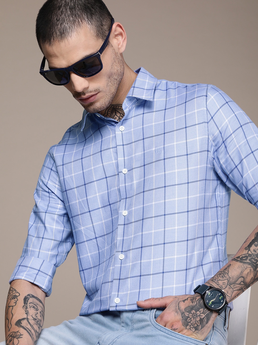 Calvin Klein Jeans Men Blue And White Smart Slim Fit Checked Pure Cotton Casual Shirt
Calvin Klein Jeans Men Blue And White Smart Slim Fit Checked Pure Cotton Casual Shirt