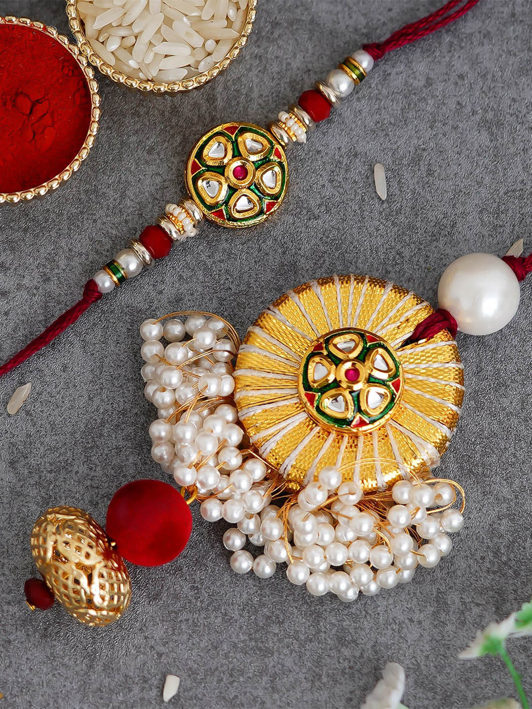 eCraftIndia Gold-Toned & Red Pearl and Stone Bhaiya Bhabhi Rakhi Set and Roli Chawal Pack, Multi
eCraftIndia Gold-Toned & Red Pearl and Stone Bhaiya Bhabhi Rakhi Set and Roli Chawal Pack, Multi