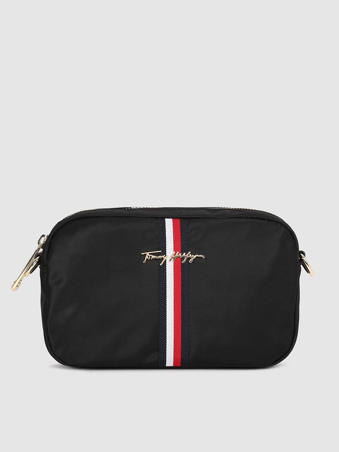 Tommy Hilfiger Black Solid Regular Structured Crossover Sling Bag with Applique Detail
Tommy Hilfiger Black Solid Regular Structured Crossover Sling Bag with Applique Detail