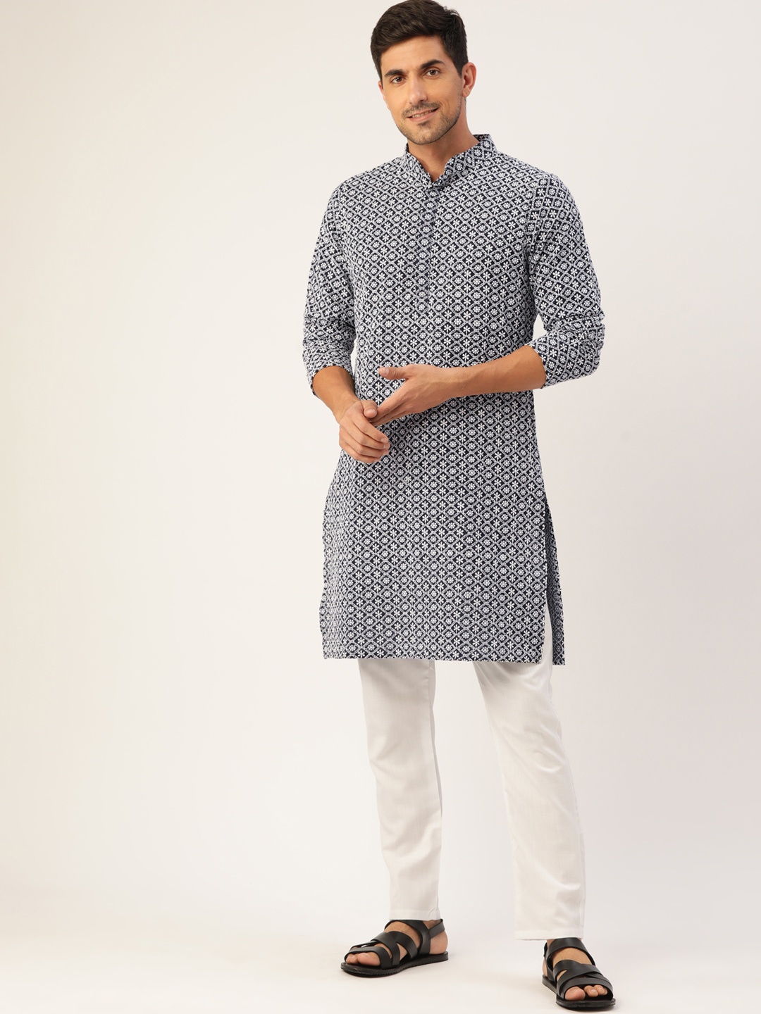 Molly & Michel Men Navy Blue & White Chikankari Embroidered Cotton Kurta with Pyjamas
Molly & Michel Men Navy Blue & White Chikankari Embroidered Cotton Kurta with Pyjamas