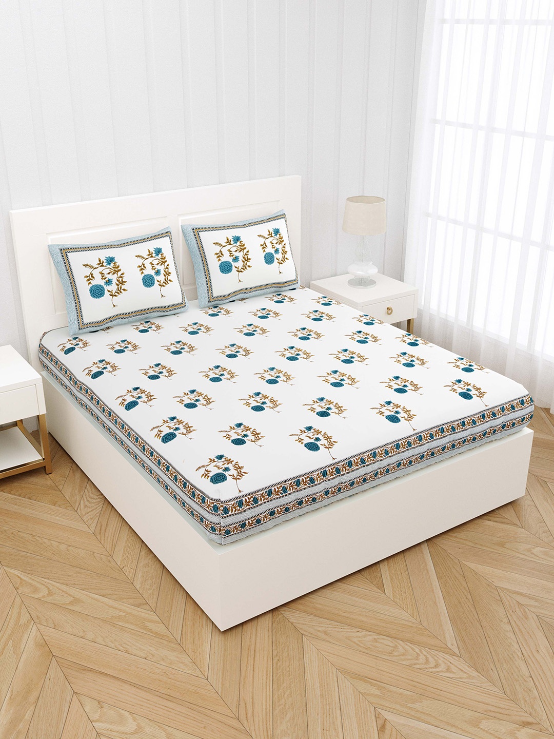 JAIPUR FABRIC Blue & White Floral 300 TC Cotton King Bedsheet with 2 Pillow Covers
JAIPUR FABRIC Blue & White Floral 300 TC Cotton King Bedsheet with 2 Pillow Covers