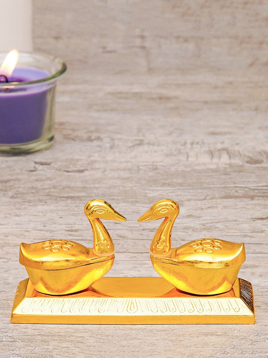 StatueStudio Gold-Toned Oxidised Peacock Shaped Kumkum Dibbi
StatueStudio Gold-Toned Oxidised Peacock Shaped Kumkum Dibbi