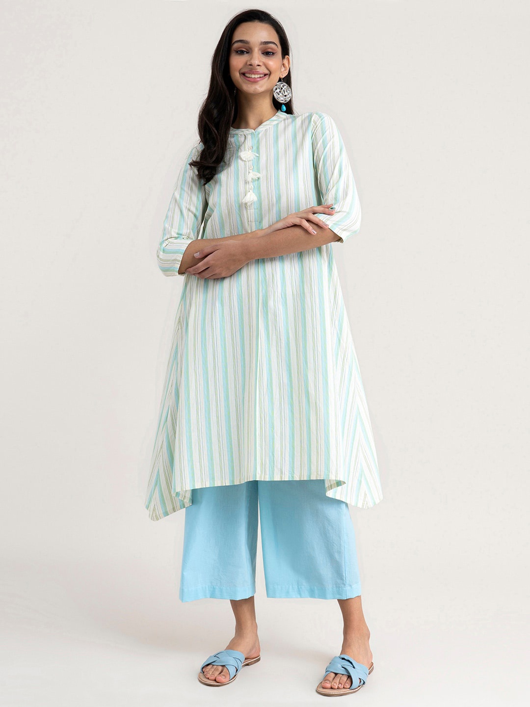 Pink Fort Women Cream-Coloured Striped Keyhole Neck Flared Sleeves Gotta Patti Kurta
Pink Fort Women Cream-Coloured Striped Keyhole Neck Flared Sleeves Gotta Patti Kurta