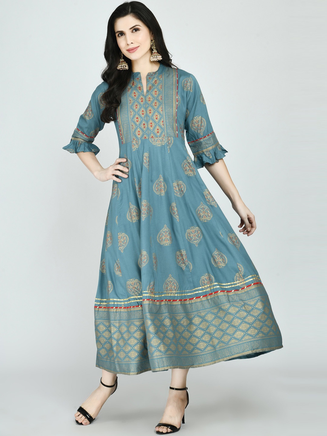 KALINI Women Turquoise Blue Ethnic Motifs Printed Flared Sleeves Thread Work Anarkali Kurta
KALINI Women Turquoise Blue Ethnic Motifs Printed Flared Sleeves Thread Work Anarkali Kurta